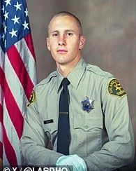 Portrait of Detective Joshua Kelley-Eklund